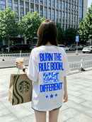 BURN THE RULE BOOK TEE